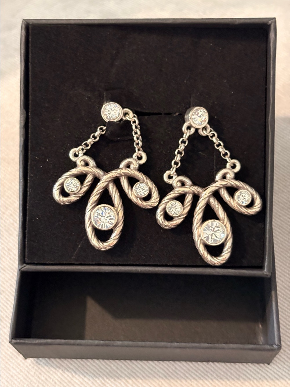 Silver-tone Crystal Drop Earrings - Elegant Twisted Loop Design